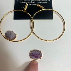 Junk jewelry. Pair of earrings but one has broken stone.